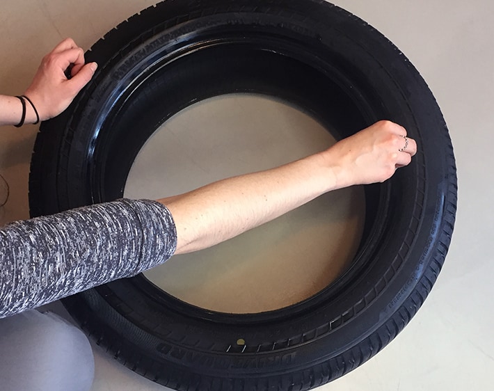 Cleaning tire to turn it into an ottoman