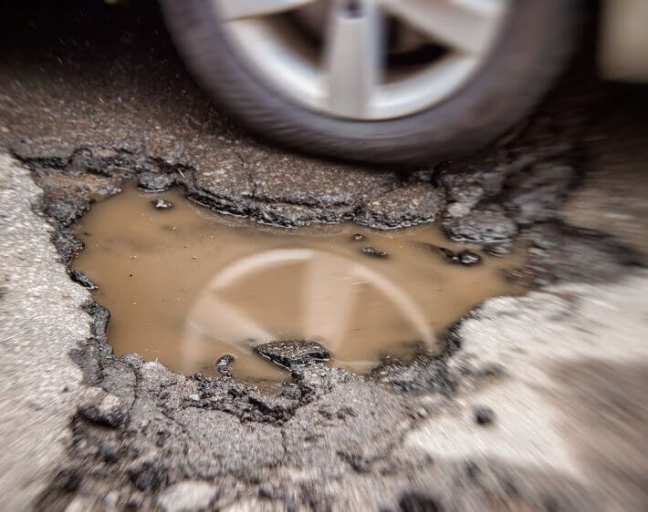 Hit A Pothole? Signs You May Need New Shocks & Struts
