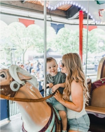 Mom and son on a carousel