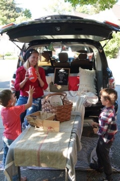 Family tailgating around a table 