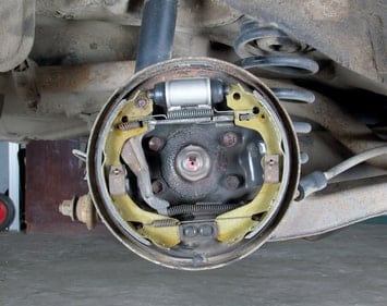 Brake shoes visible inside a drum brake
